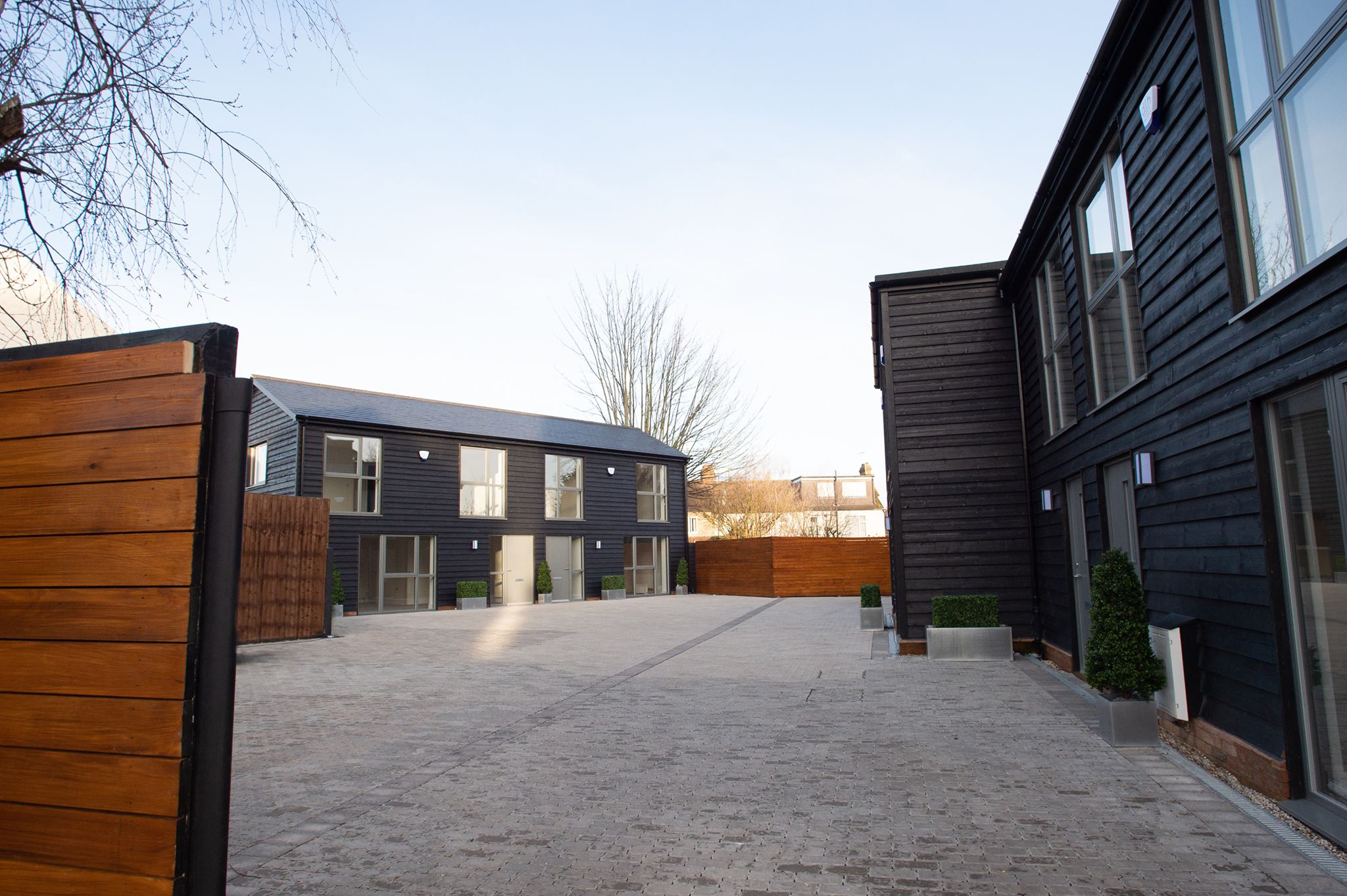 Two Barn Conversions in Chase Side North London